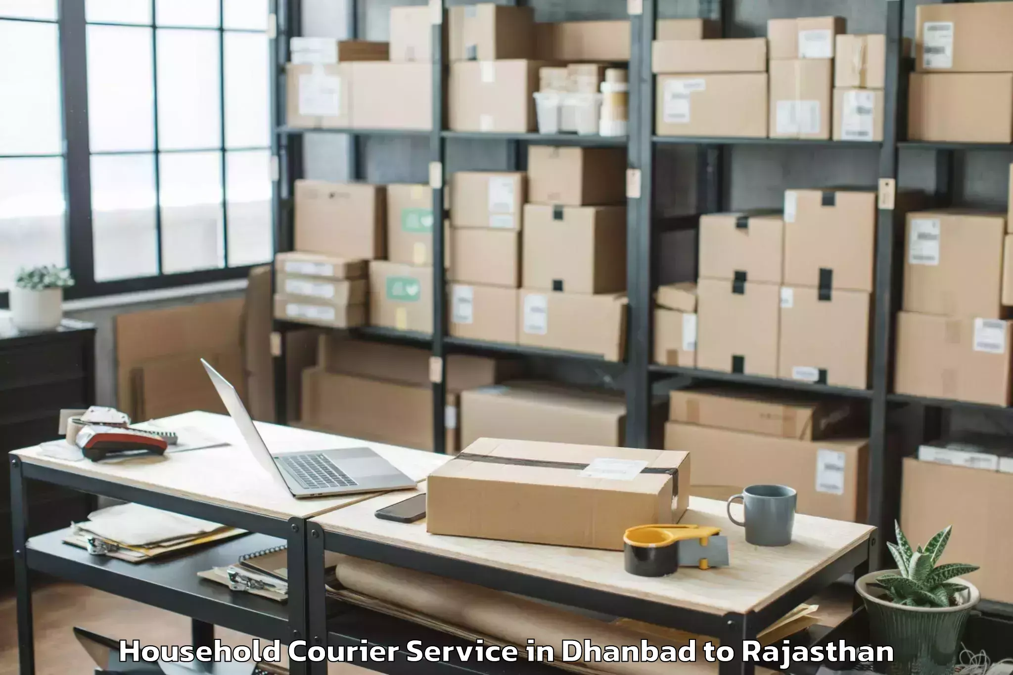 Easy Dhanbad to Sri Madhopur Household Courier Booking